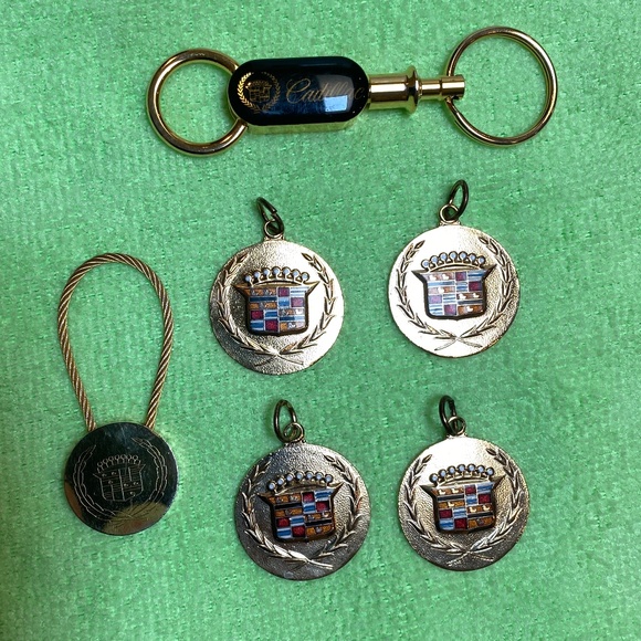 Six Cadillac Gold Tone Key Charms. - Picture 1 of 5